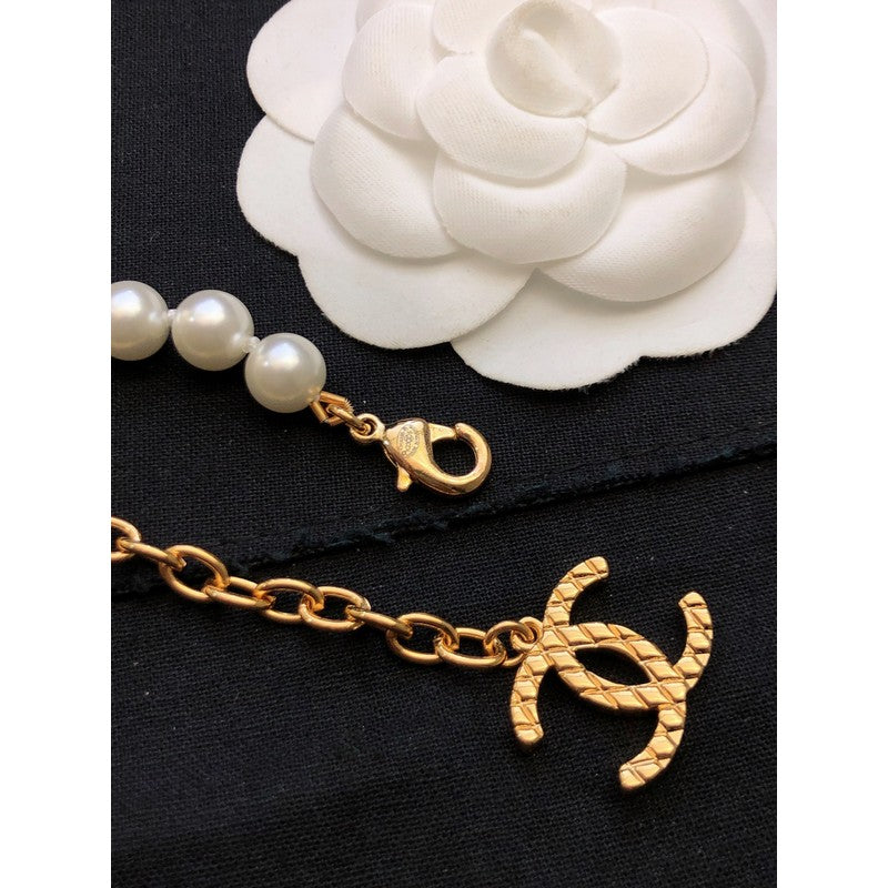 Chanel Pearl Bag Pendant 18K Gold Necklace