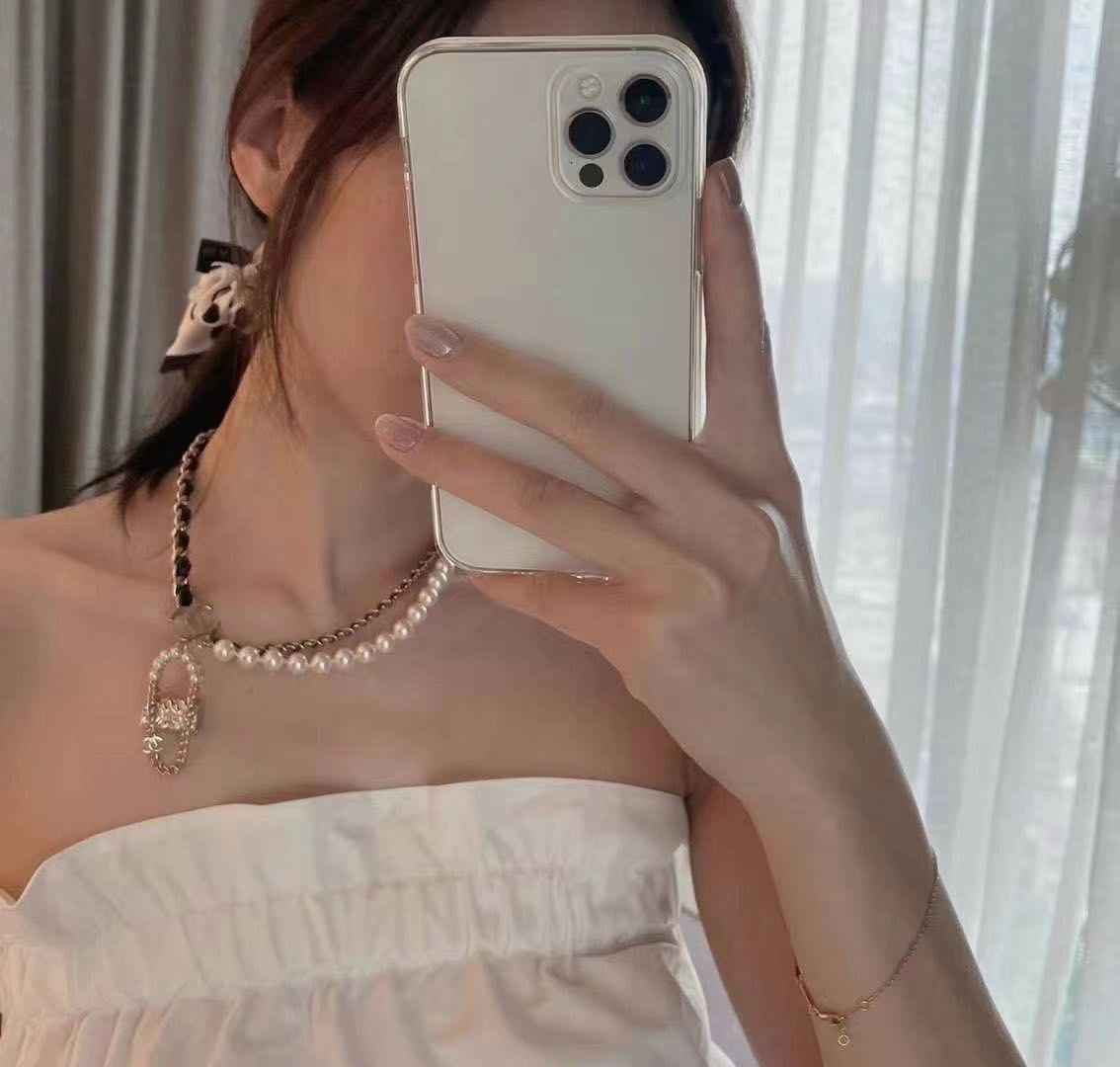 Chanel Pearl Leather Bag Pendant 18K Gold Necklace