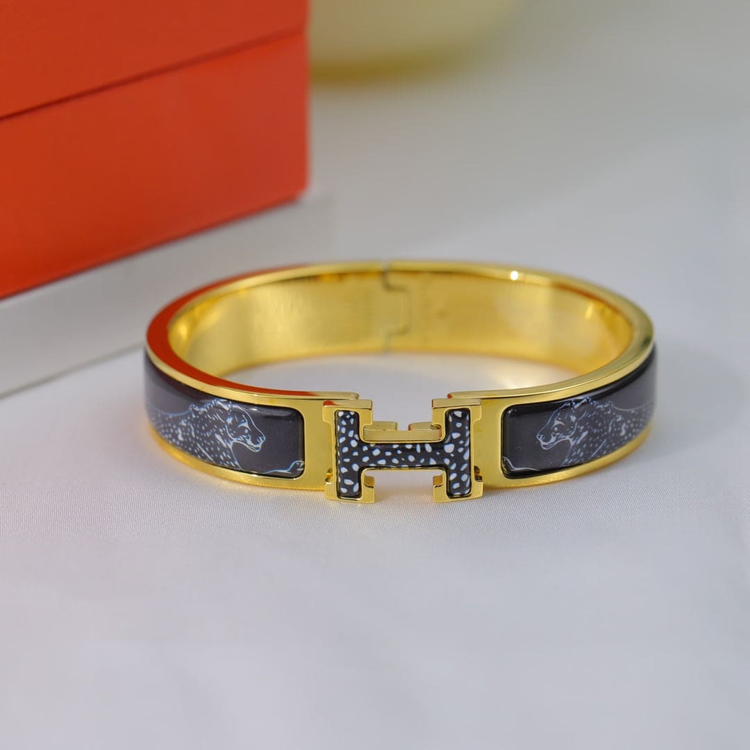 Hermes Guepards Clic Clac 18K Gold Bracelet