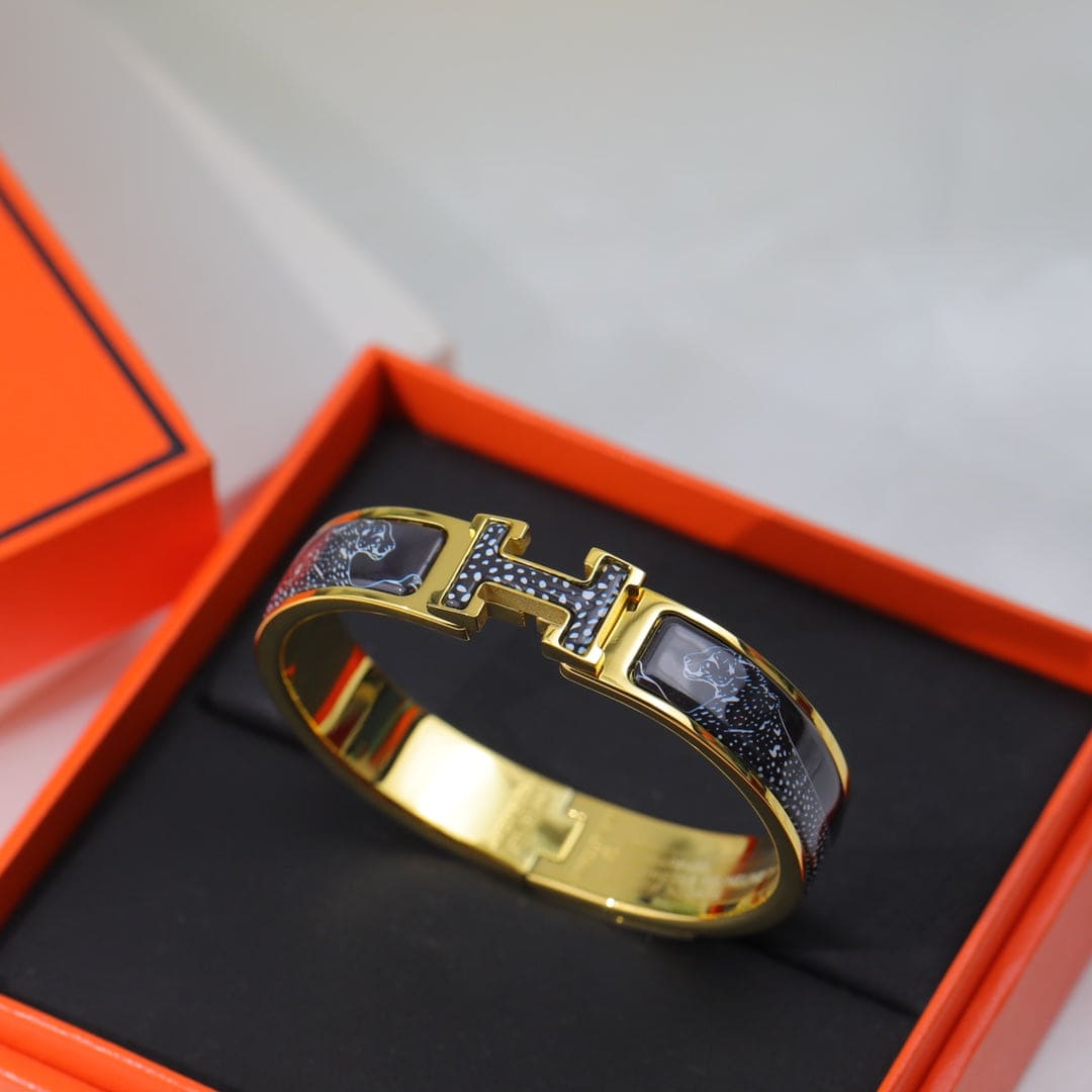 Hermes Guepards Clic Clac 18K Gold Bracelet