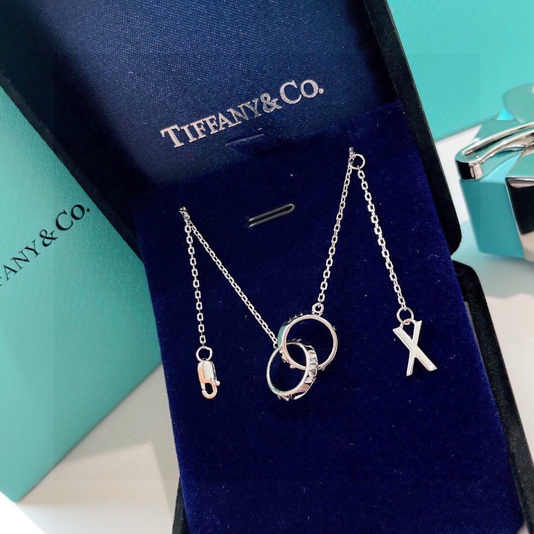 Tiffany Atlas X Closed Interlocking Pendant 18K Gold Necklace