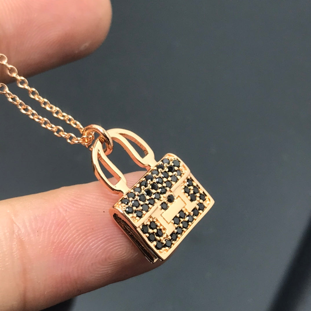 Hermes Amulettes Kelly Black Diamonds 18K Gold Necklace