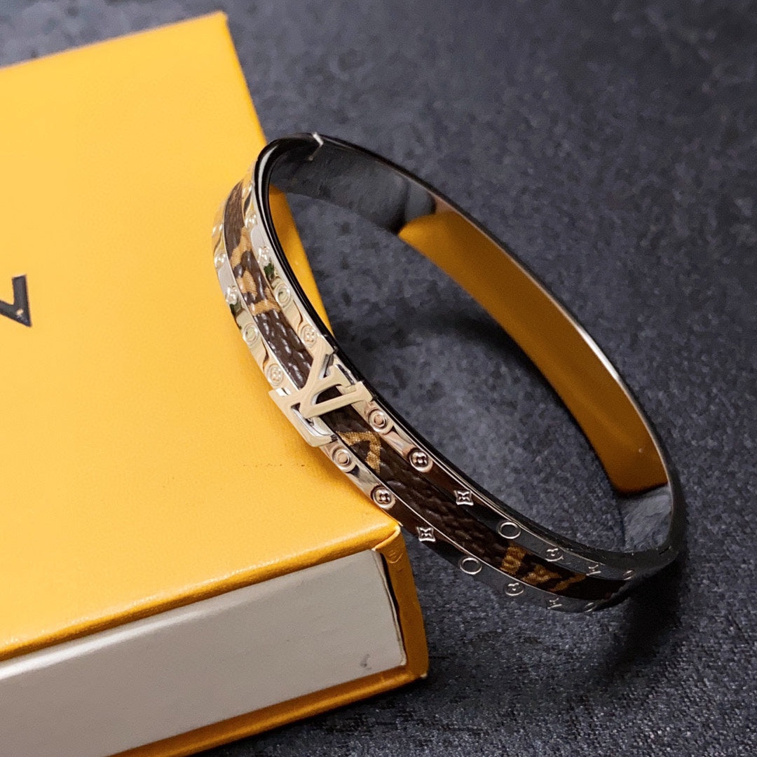 Louis Vuitton Leather Vintage 18K Gold Bracelet