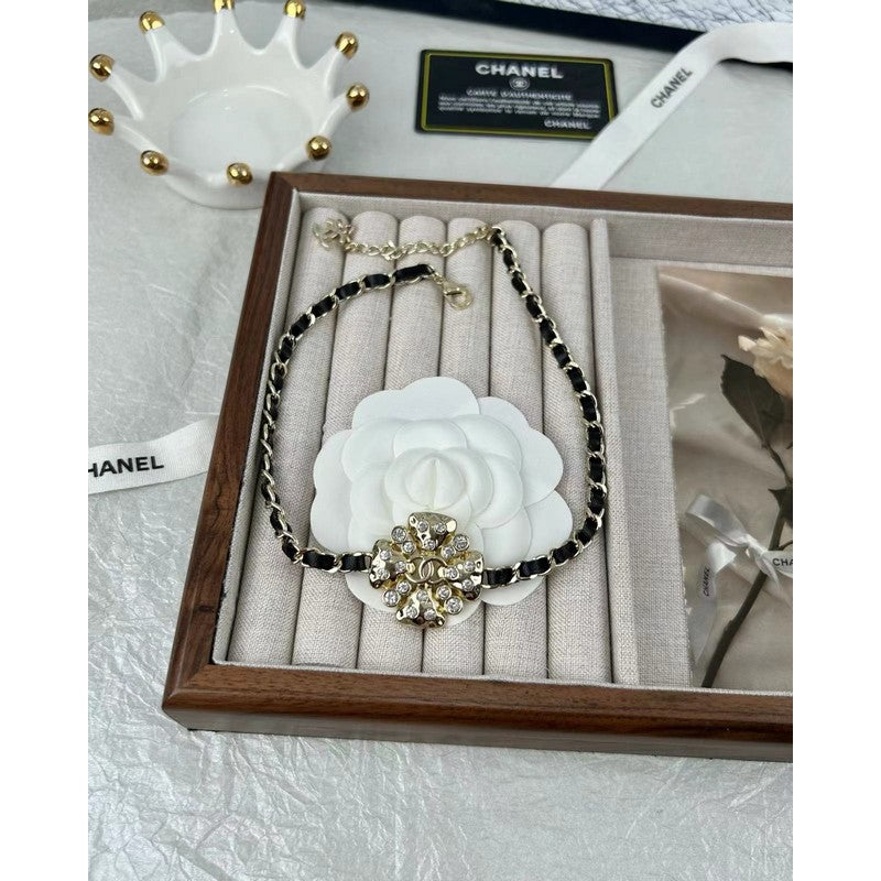 Chanel Black Leather Flower 18K Gold Necklace