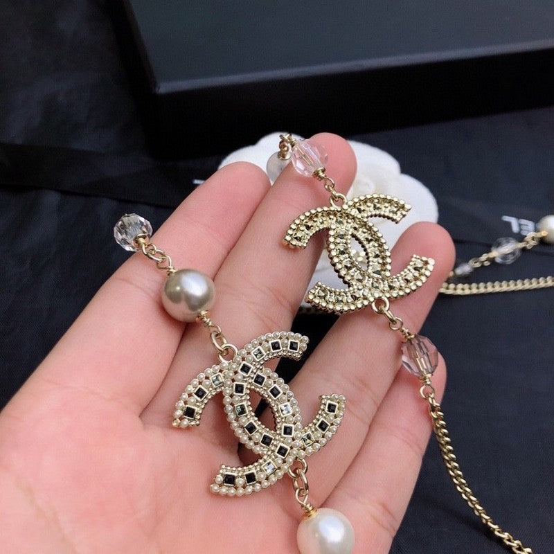 Chanel Long Pearl 18K Gold Necklace