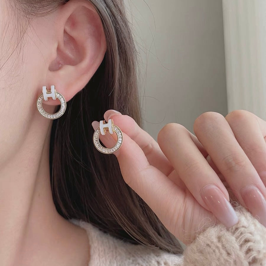 Hermes Clic Diamond 18K Gold Earrings