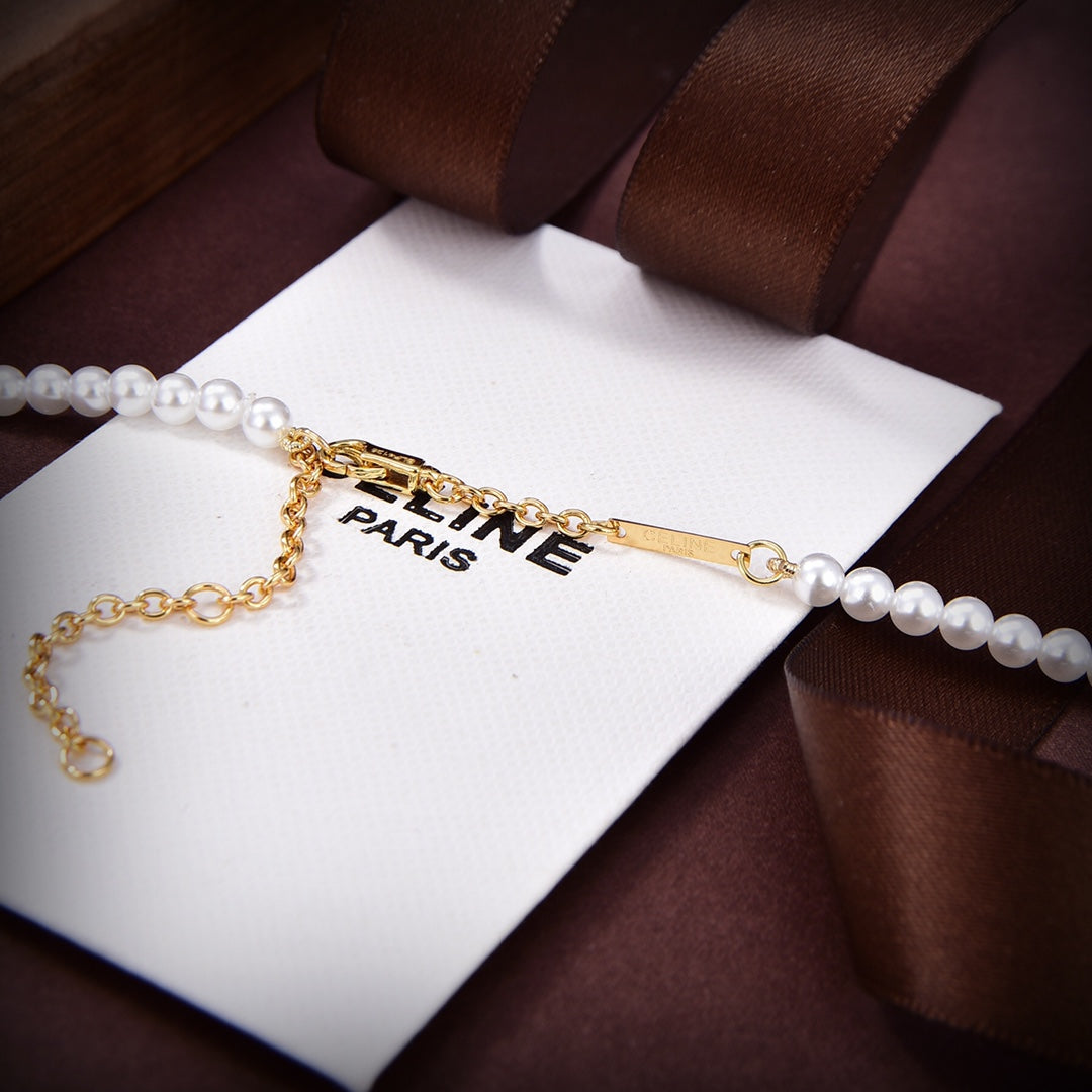 Celine Paris Pearl 18K Gold Necklace