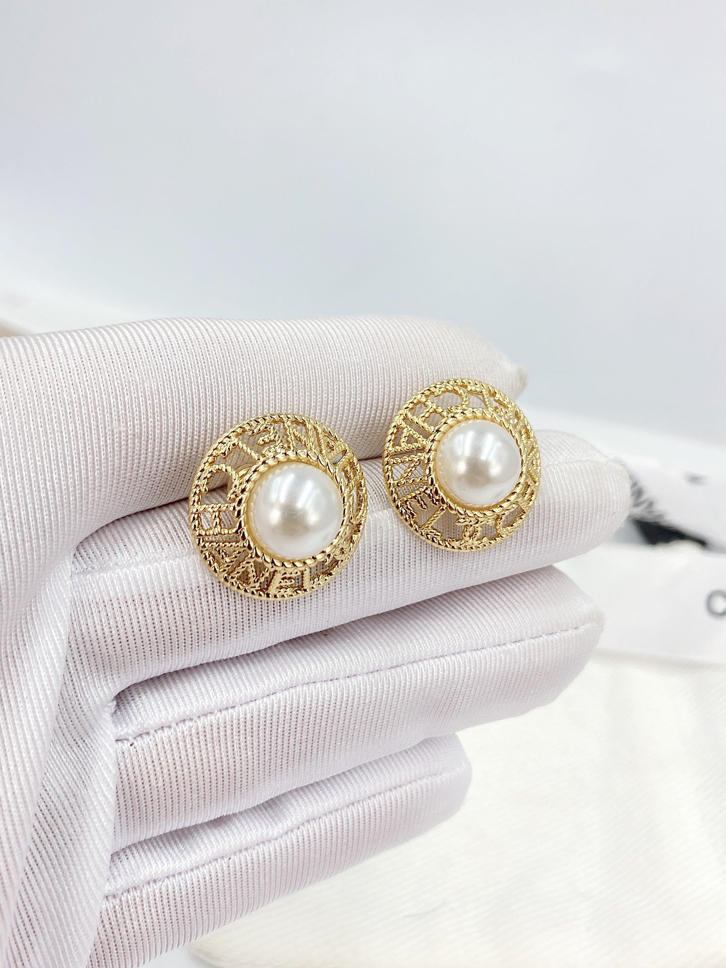 Chanel Pearl Round 18K Gold Earrings