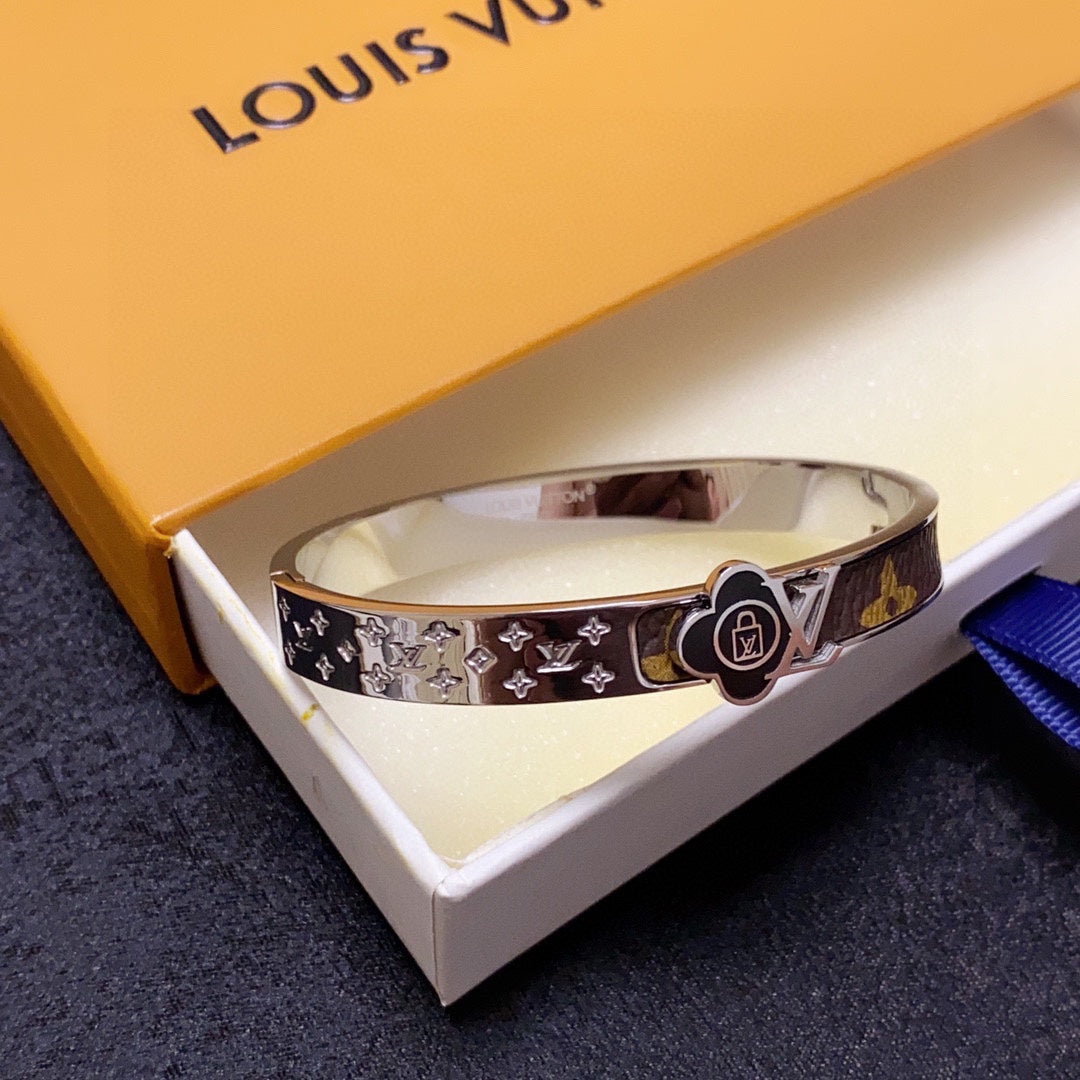 Louis Vuitton Leather Lock 18K Gold Bracelet