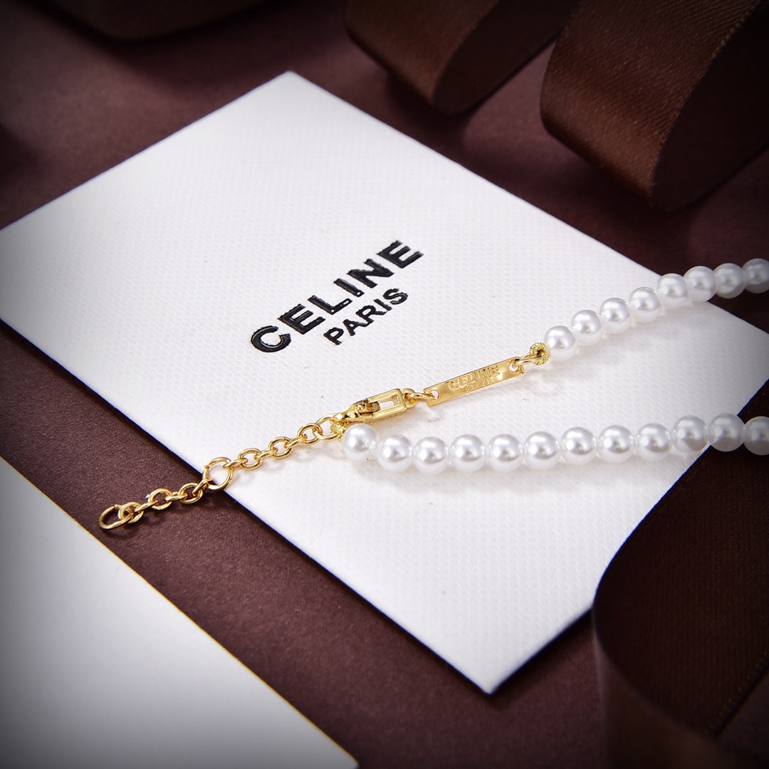 Celine Paris Pearls 18K Gold Bracelet
